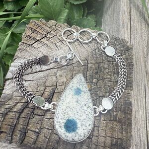 Handmade Silver Teardrop Bracelet with Blue Accent